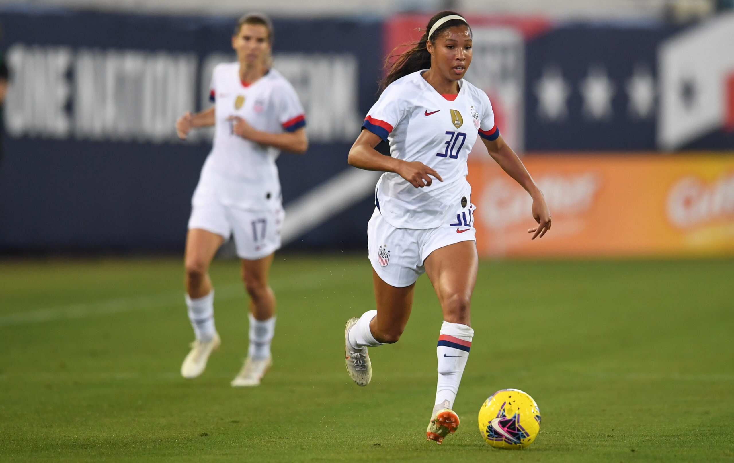 JACKSONVILLE, FL - NOVEMBER 10: Margaret Purce #30 of the United States looks for an open man downfield during a game between Costa Rica and USWNT at TIAA Bank Field on November 10, 2019 in Jacksonville, Florida.
